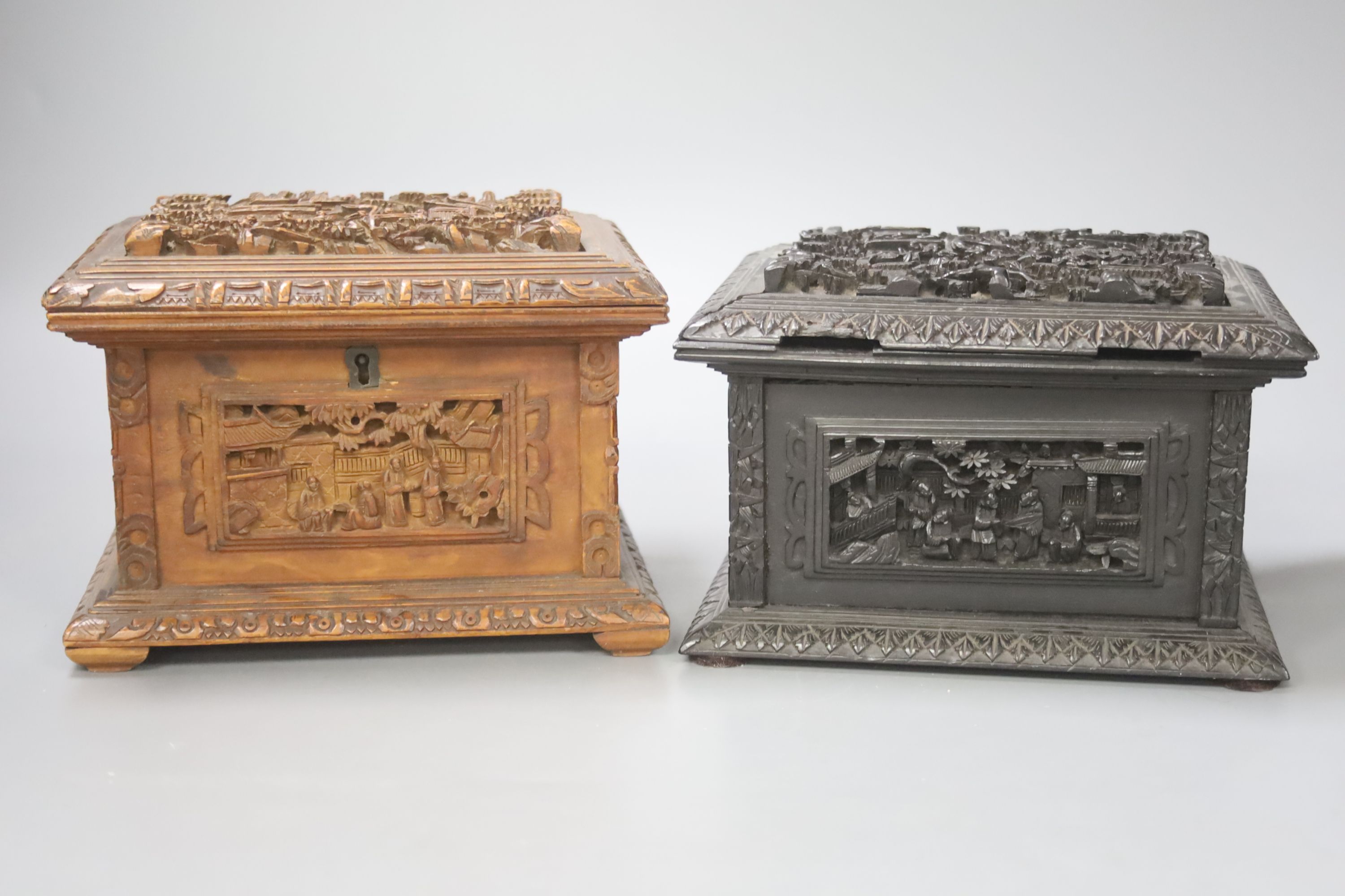 Three Chinese carved wood caskets, largest 17 x 13cm 12cm high